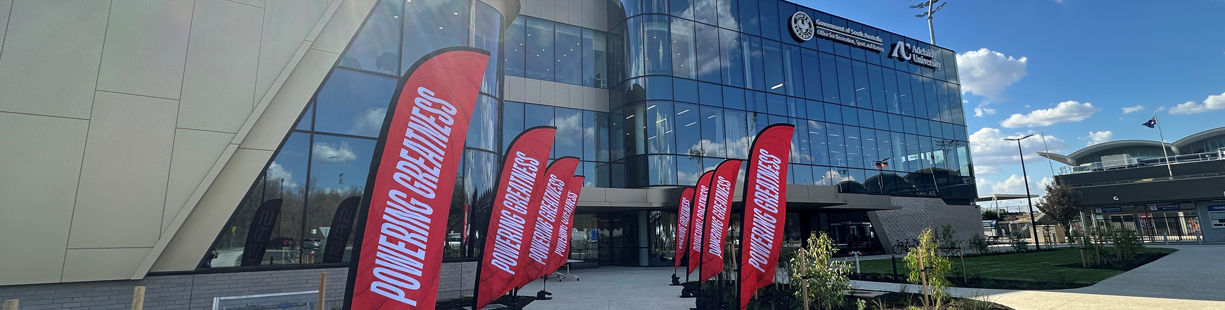 SASI building with flags out the front